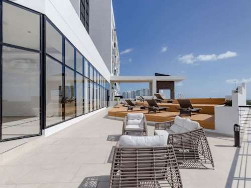 Shared rooftop pool area with lagoon views (communal)