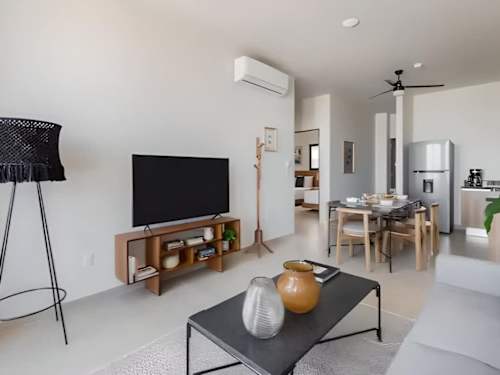 Living room with Smart TV and dining area