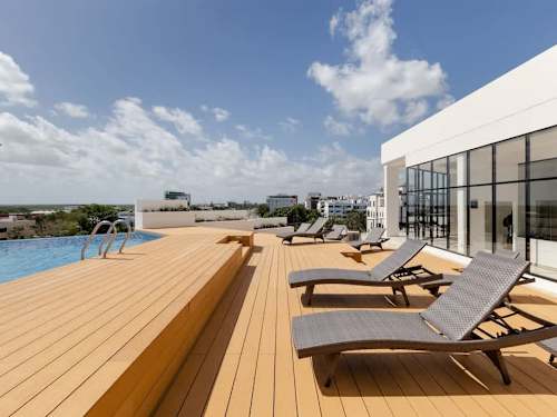 Shared rooftop pool and sundeck