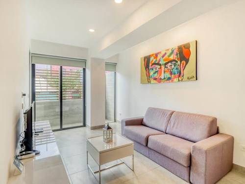Living area - bright sofa seating with natural light