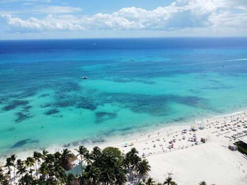 Nearby: turquoise Caribbean beach of Playa del Carmen