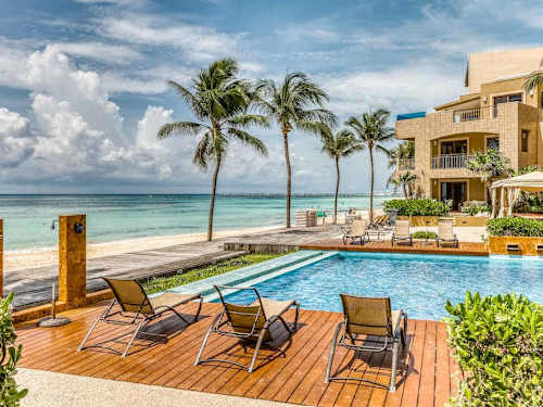 Shared pool deck and palapas