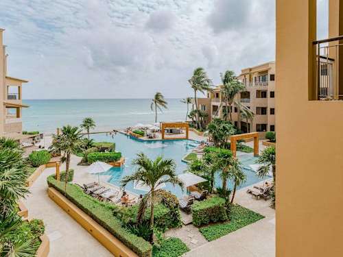 Shared communal infinity pool with ocean view