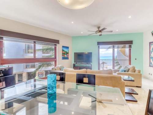 Living room with smart TV and sea view