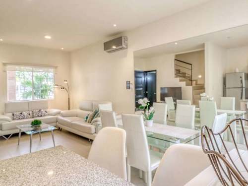 Bright living room with comfortable sofas