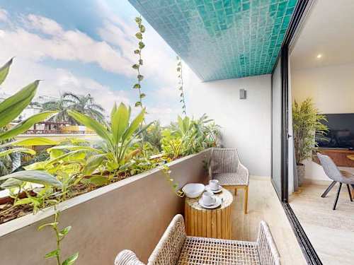 Private balcony with seating and ocean views