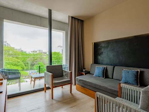 Living area with sofa bed and TV