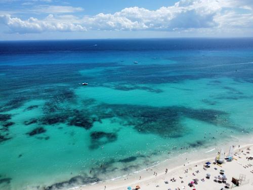 Nearby: Caribbean beach and turquoise sea