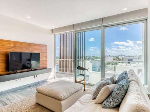 Bedroom with ocean view, smart TV and private balcony