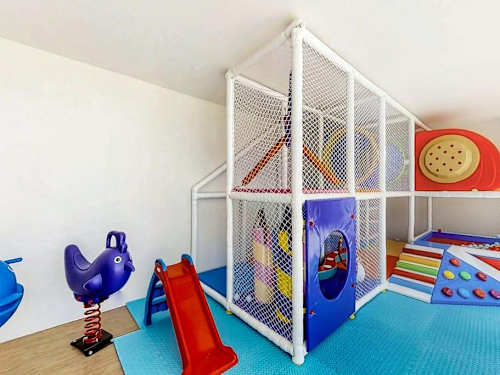 Children's indoor play area (jungle gym) in the building