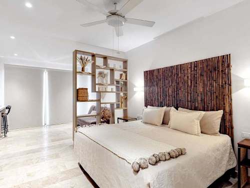 Living area with sofa and beds