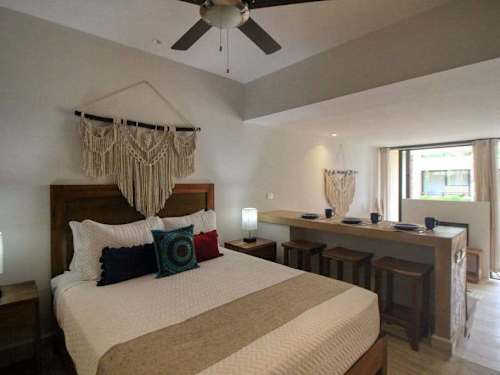 Studio sleeping area with king bed