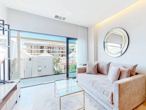 Open-plan living area with balcony access