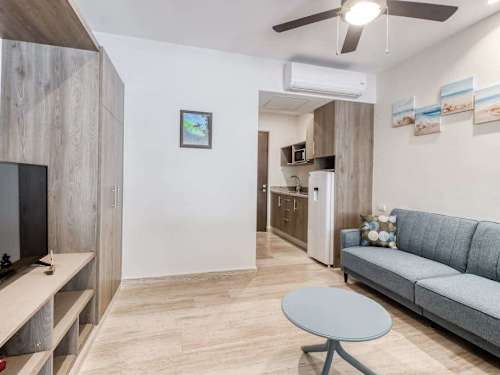 Living area with sofa and smart TV