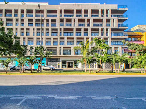 Beachfront condominium building exterior (shared)