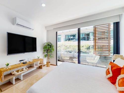 Living and dining area with smart TV
