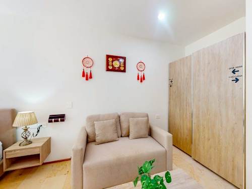 Open-plan living and dining area with smart TV