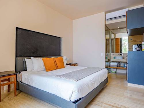 King bed in the studio sleeping area