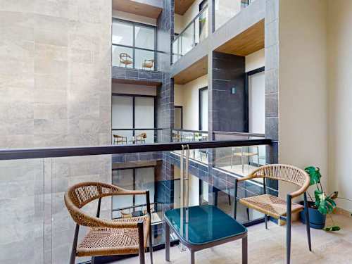 Shared rooftop terrace with plunge pool and seating