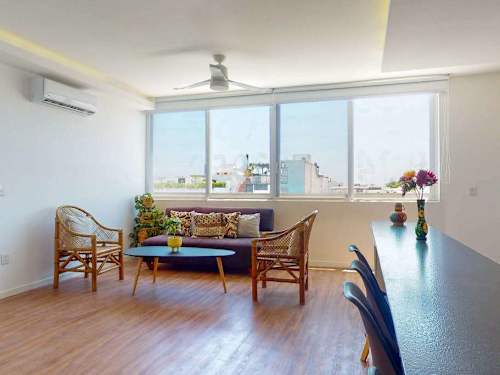 Shared rooftop pool with ocean view
