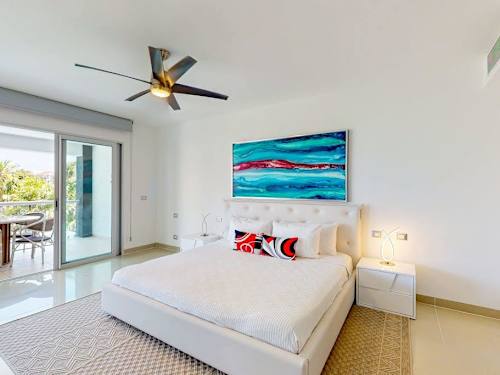 Bedroom with modern decor and artwork
