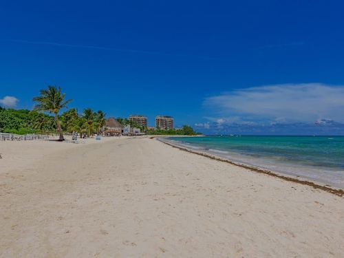 Nearby: white-sand beach and turquoise Caribbean Sea