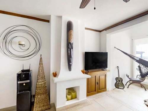 Living and dining area with ceiling fan