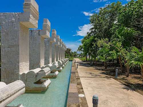 Lush communal garden and pool area (shared)