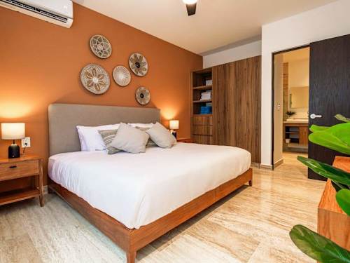 Master bedroom with a comfortable king bed