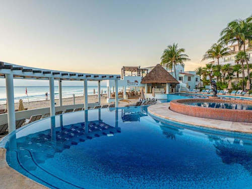 Beachfront resort pool overlooking the sea