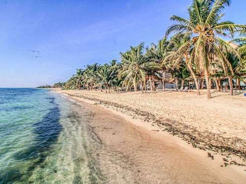 Caribbean shoreline directly in front of the villa