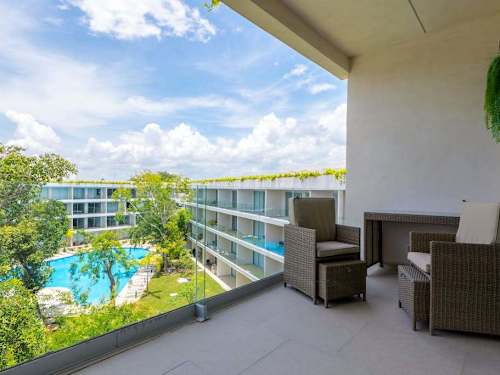 Private balcony with views of the shared pool