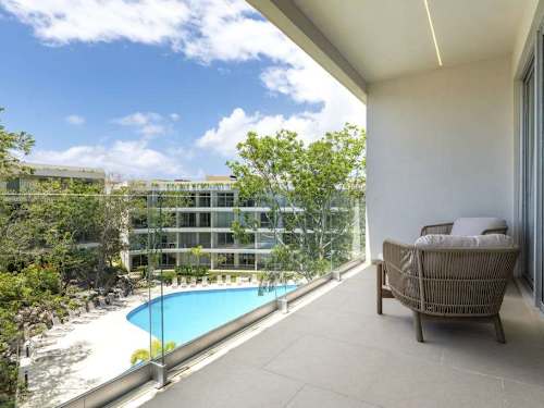 Private balcony with pool and garden views