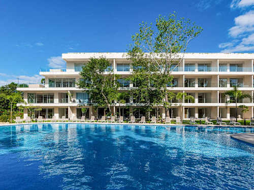 Condo complex exterior and shared pool
