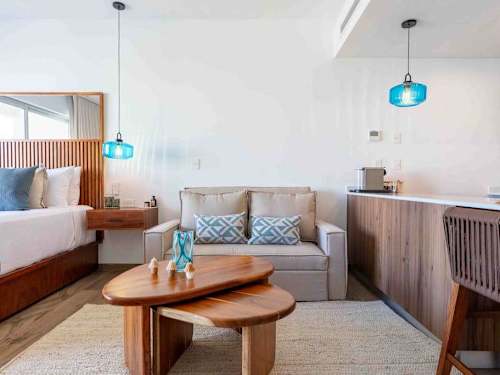 Dining and living space with natural light