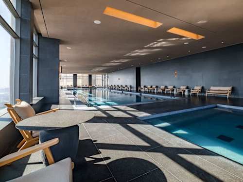 Sleek indoor lap pool, glide through laps or unwind in a calm resort-like setting