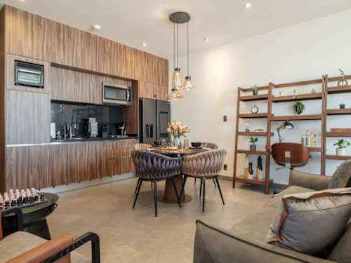 Warm wood kitchen and dining nook, everything you need to cook and gather in comfort