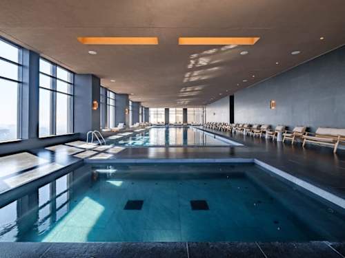 Indoor lap pool for laps or a slow unwind, a serene retreat inside the building