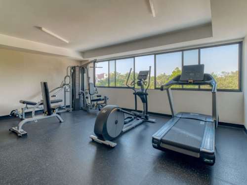 On-site gym with treadmill and free weights, keep your routine without leaving the building