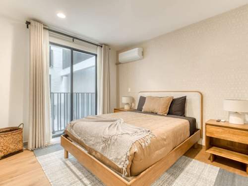 Restful bedroom with a plush king bed and a private balcony, easy nights in the heart of Condesa