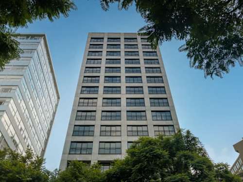 Dramatic tower rising against the sky, the architecture of Mexico City's historic center