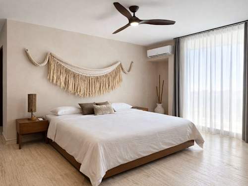 Bedroom with king-size bed and ceiling fan