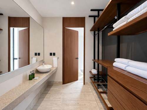Bedroom entrance with wardrobe and natural light