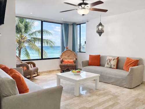 Living room with sea views and comfy seating