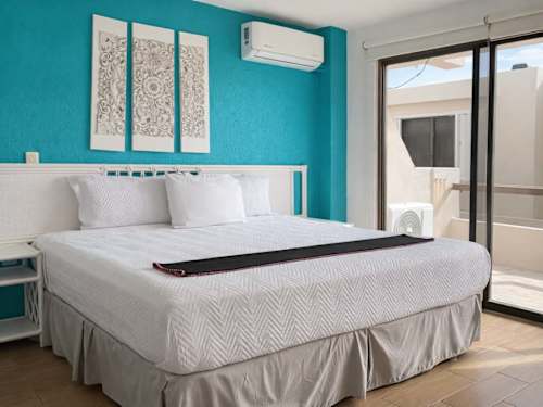 Bedroom with king bed and ocean view