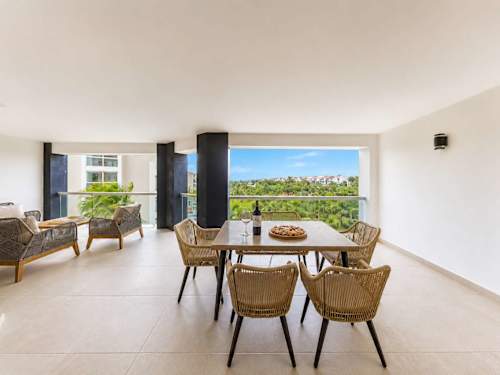 Private balcony with outdoor dining and seating