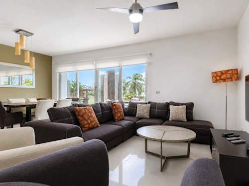 Comfortable living room with sofas and TV