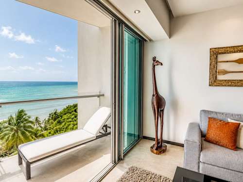 Private balcony with panoramic Caribbean Sea views