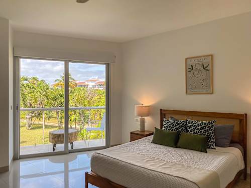 Bright bedroom with comfortable seating