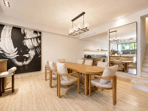 Open-plan dining area with designer decor.